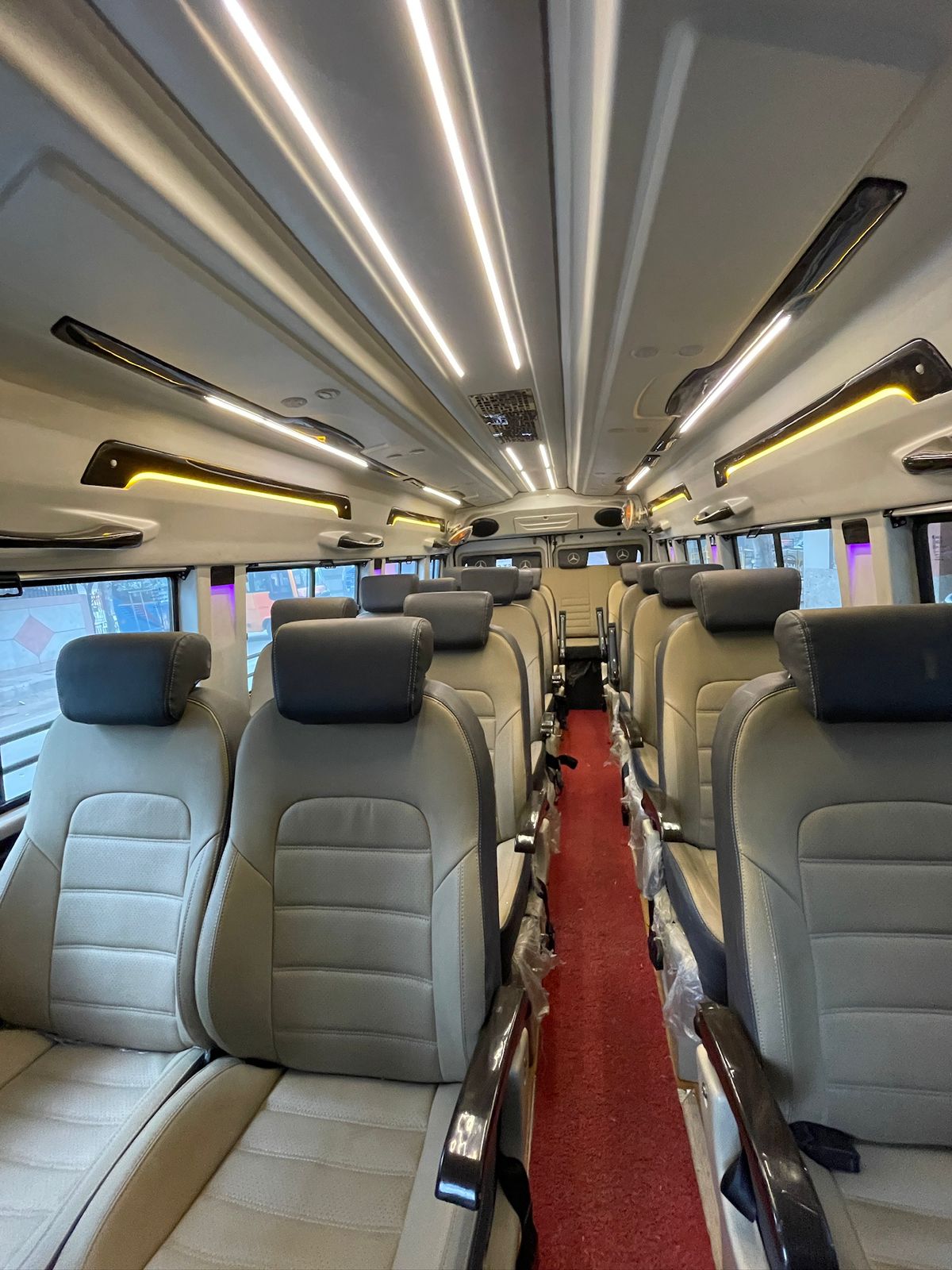 Rent 22+1 tempo traveller